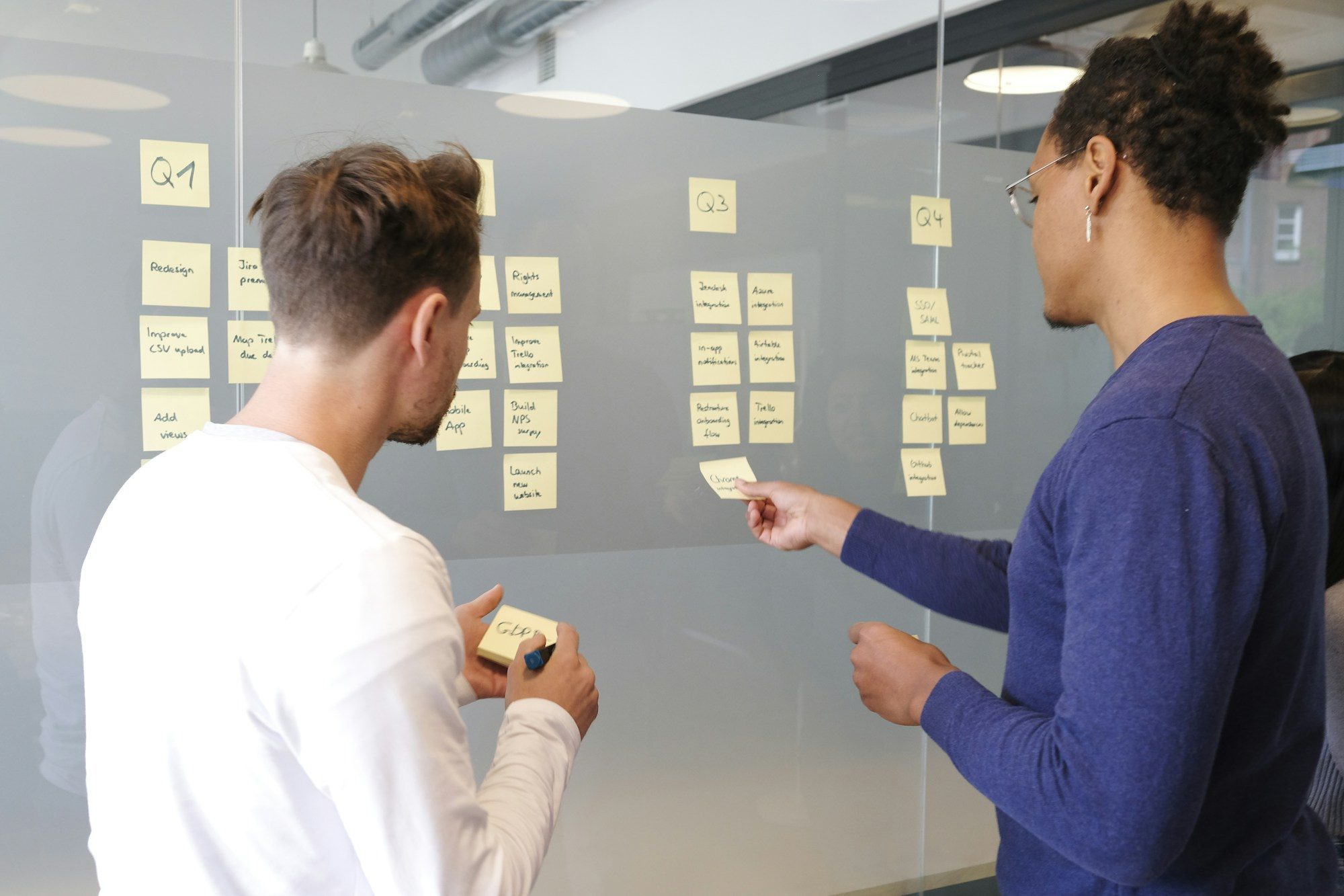 A team discussing a strategy in a bright office meeting